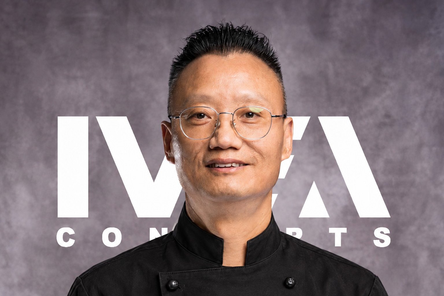 Chef Dong Liu in a black IVEA chef's jacket