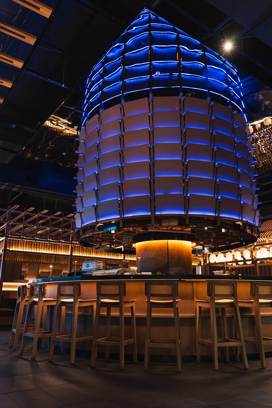 A glowing drum-shaped lantern above the bar at Gyu San Columbia