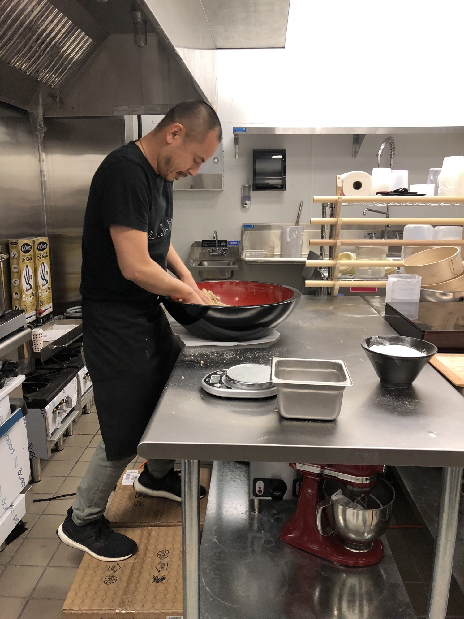 Soba master Shuichi Kotani making buckwheat soba in the kitchen of the first Akira Ramen in Rockville in 2018